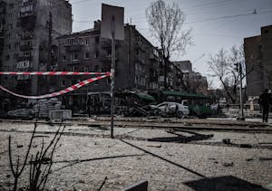 A devastated street in Kyiv showcasing war damage and destruction.
