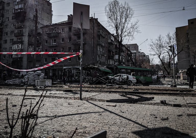 A devastated street in Kyiv showcasing war damage and destruction.